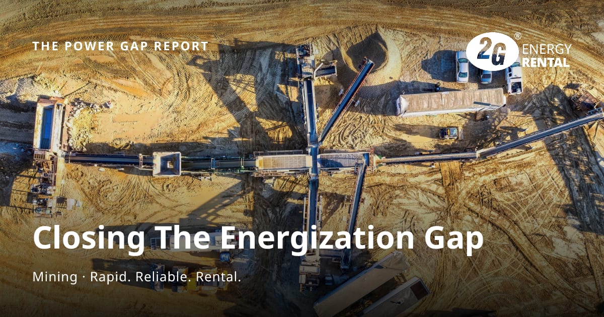 Aerial view of crushing and conveyor machinery working an open mine site